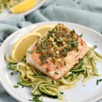 Lemon Garlic topped Mahi Mahi served on a bed of zucchini noodles