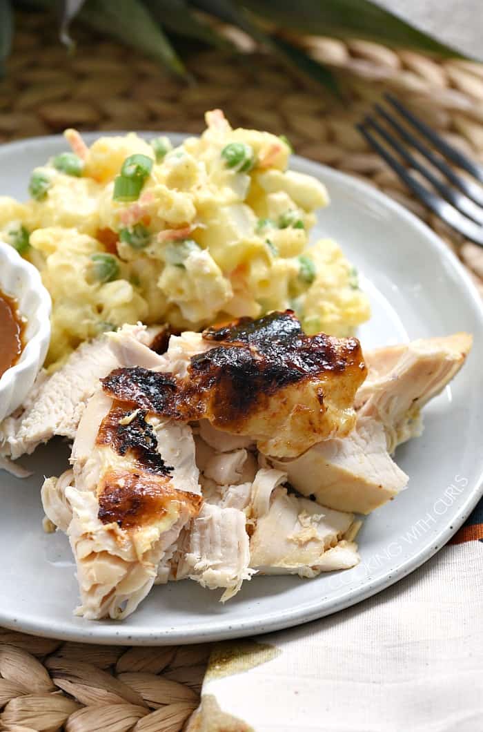 Instant Pot Huli Huli Chicken served with Hawaiian Potato Salad on a white plate.