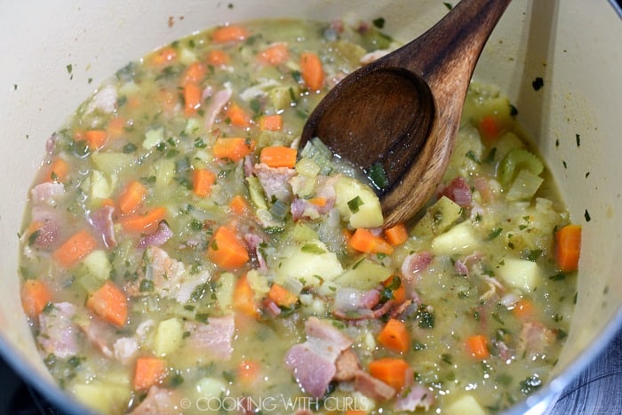 A wooden spoon used to smoosh some of the vegetables in the Seafood Chowder. 