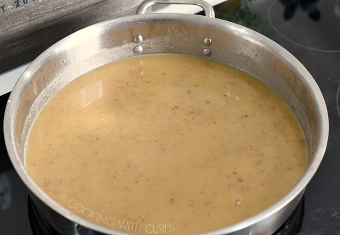 Add the chicken stock and scrape the bottom of the skillet to deglaze cookingwithcurls.com