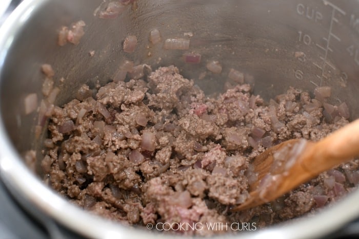 ground beef added to the onions.