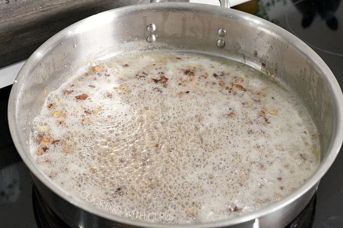 Add the seasoned flour to the skillet cookingwithcurls.com