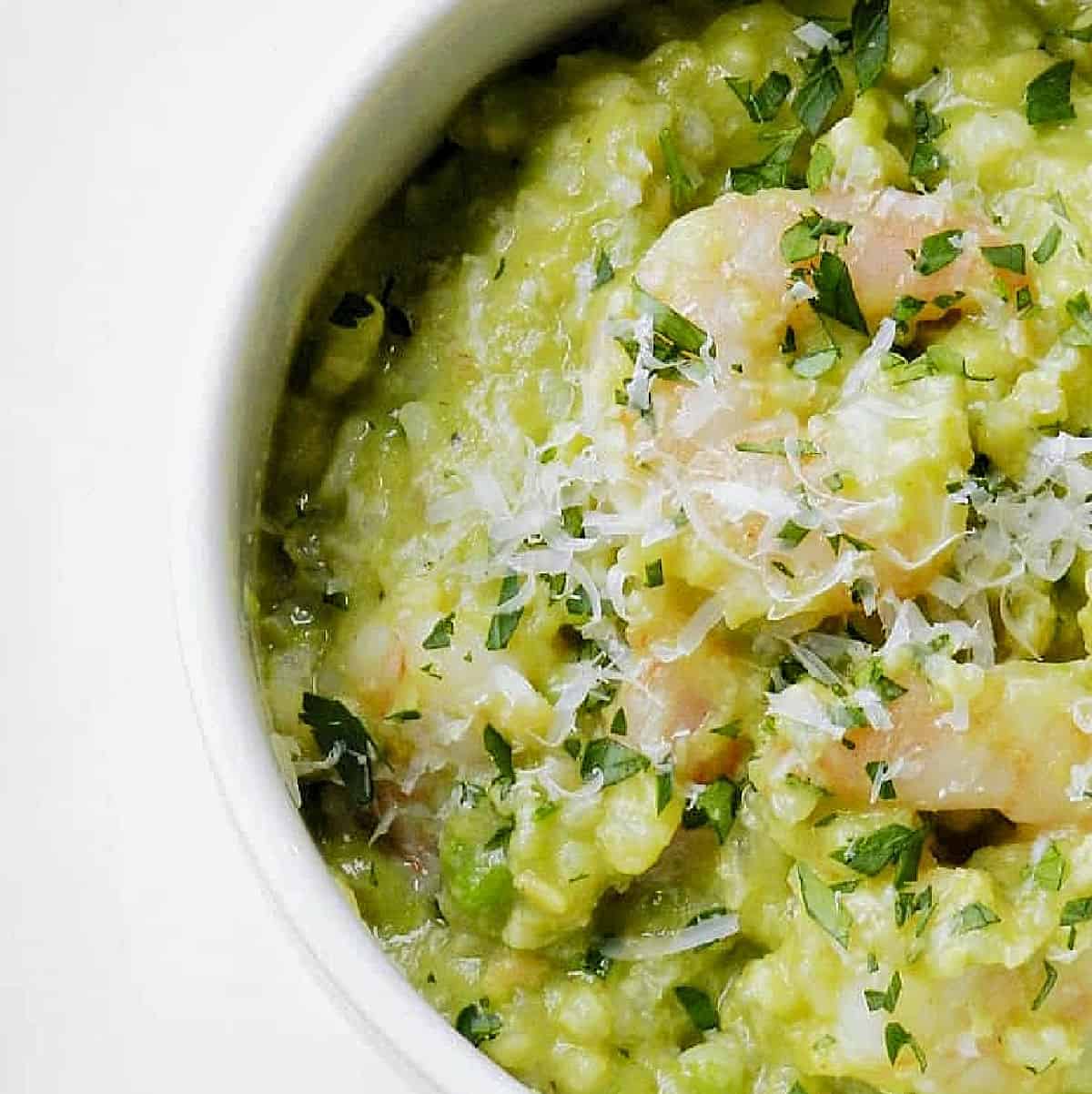 A bowl of avocado shrimp risotto.