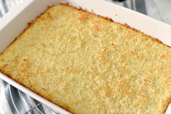 Baked Pina Colada Bars in a white baking dish. 