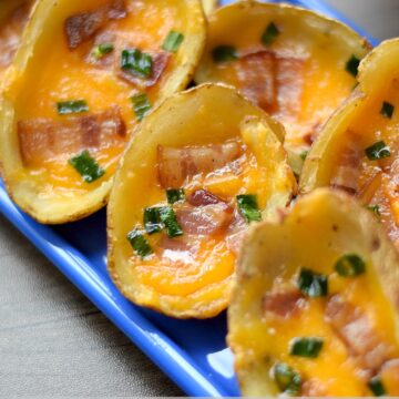 Baked Potato Skins on a long rectangle blue plate