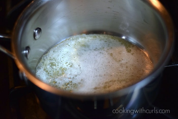 melted butter simmering in a saucepan.