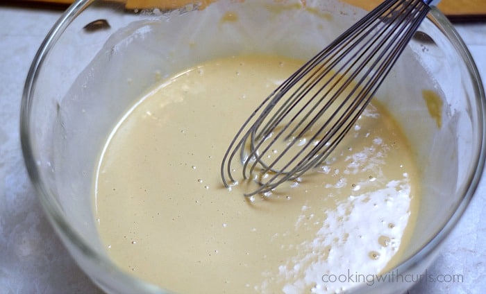 Batter whisked together in a large bowl.