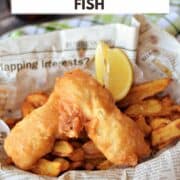 Beer Batter Fish on a bed of French fries in a newspaper lined basket with title graphic across the top.