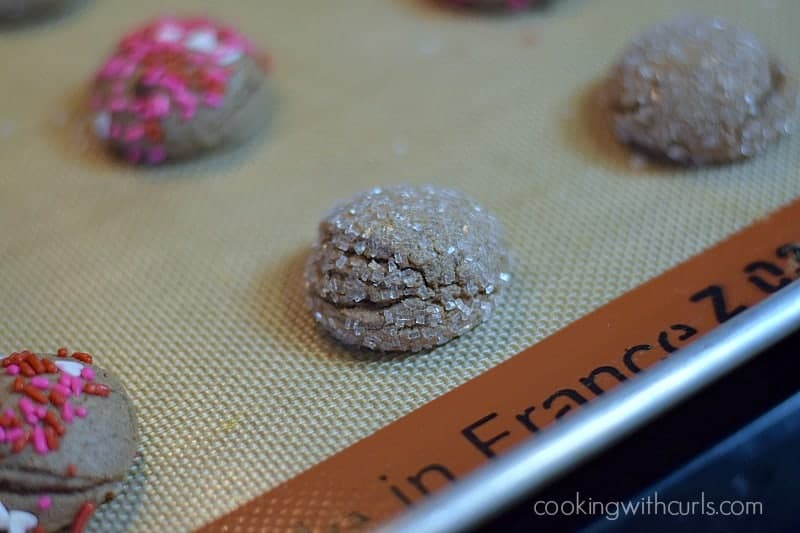 Chocolate Peanut Butter Kisses Cookies baked on a silicone lined baking sheet