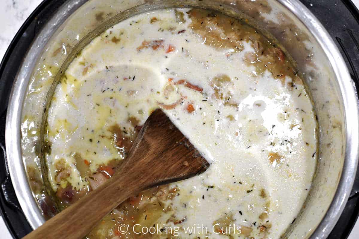 Cream added to the cooked clam chowder. 