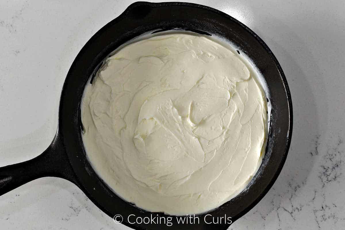 Cream-cheese-spread-in-a-cast-iron-skillet.