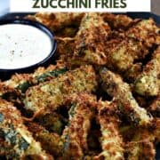 A plate filled with crispy zucchini fries with a small bowl of ranch dressing and title graphic across the top.