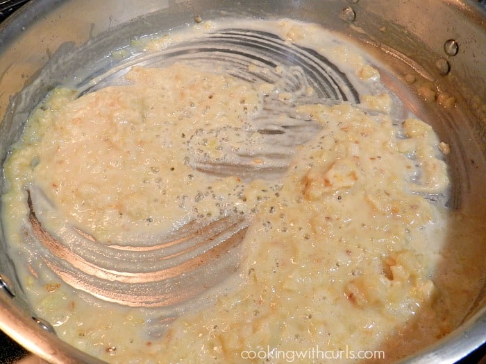 Flour mixed into the melted butter and onions in a large skillet. 