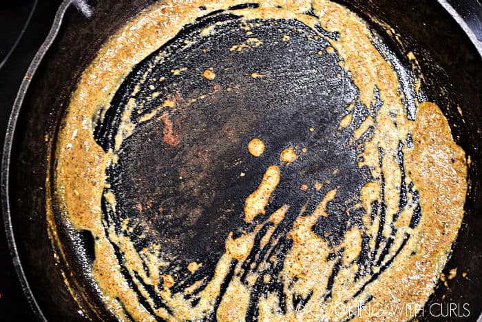 Flour whisked into the butter in a cast iron skillet.