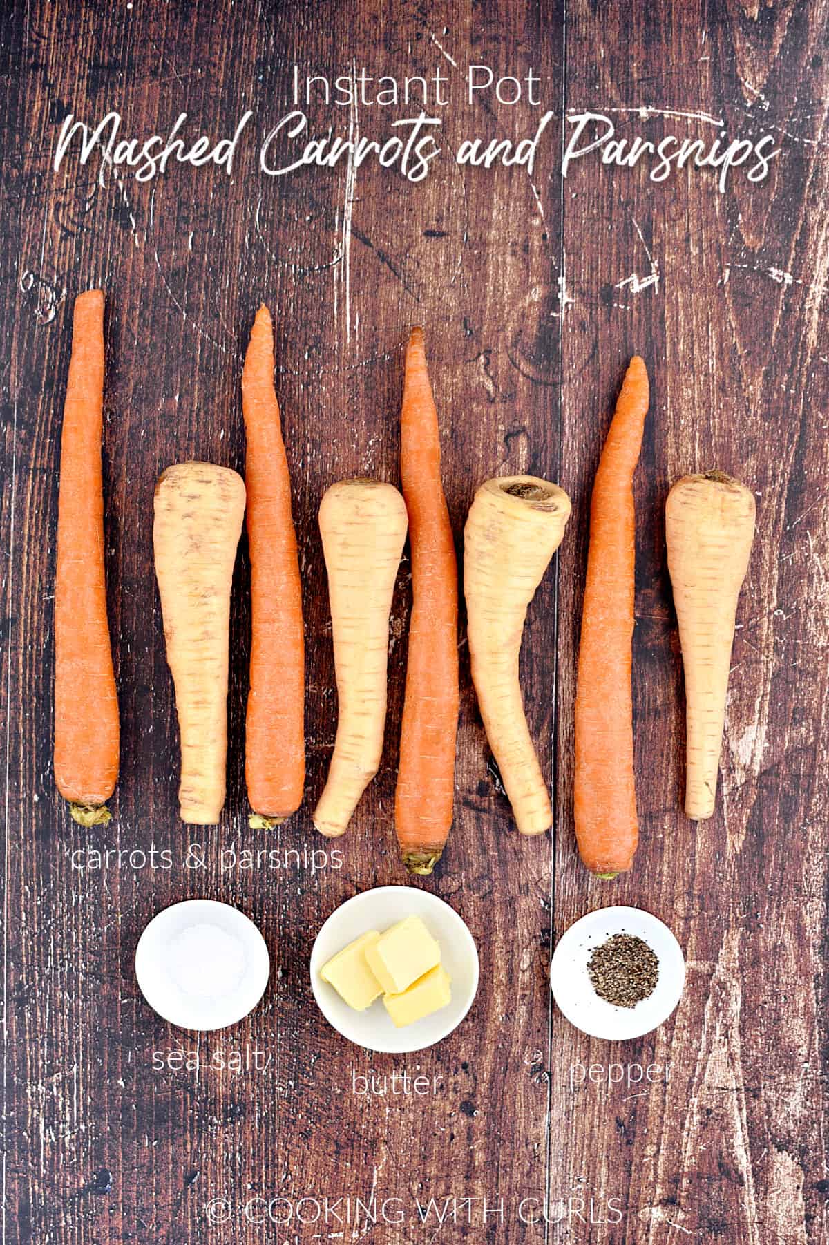 Four carrots, four parsnips, salt, butter pats and pepper in small white bowls. 