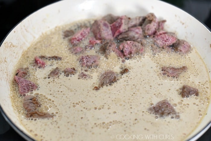 Guinness poured into the pan to deglaze after browning the beef. 