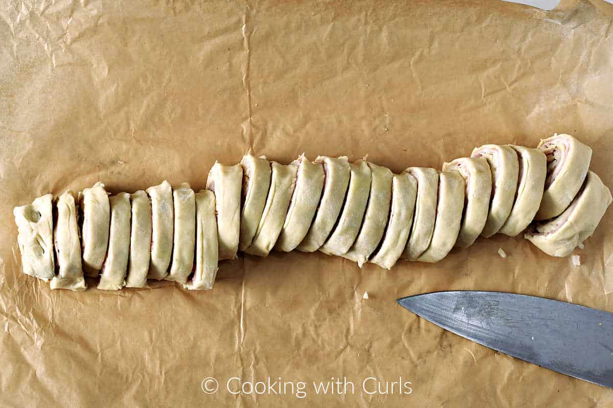 Ham-and-cheese-puff-pastry-roll-cut-into-twnety-four-slices.