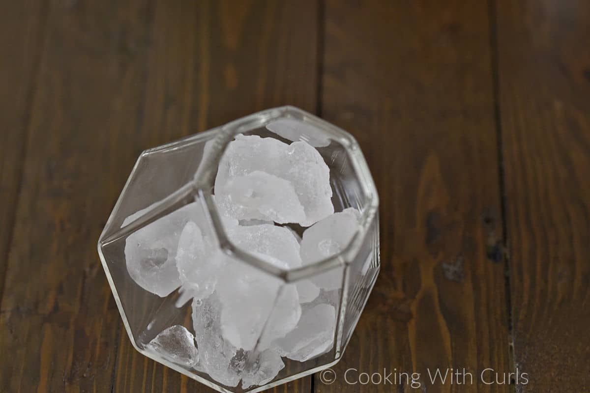 Ice cubes in a square cut glass. 