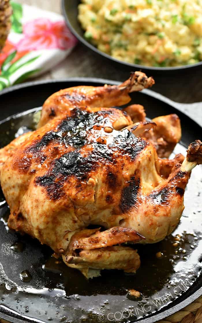 A whole Instant Pot Huli Huli Chicken on a cast iron skillet. 