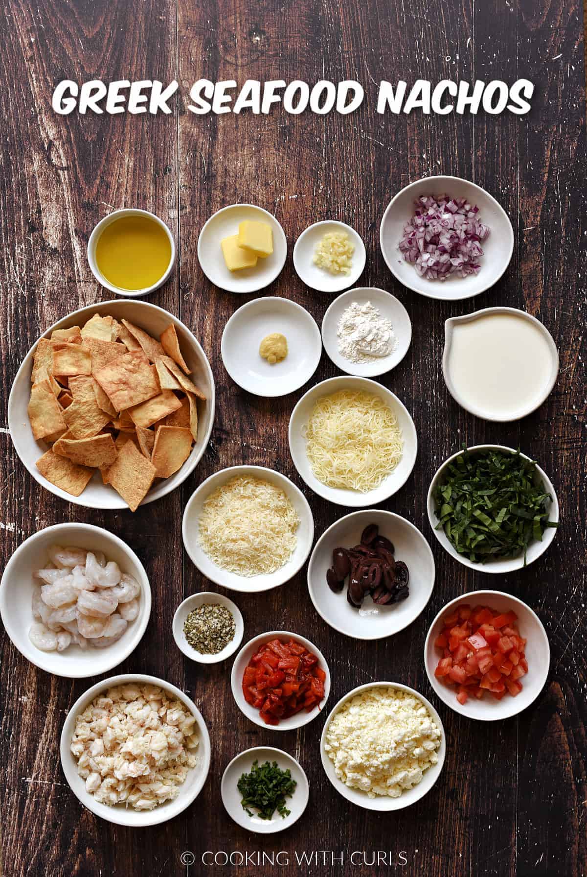 Ingredients to make Greek seafood nachos in small bowls.