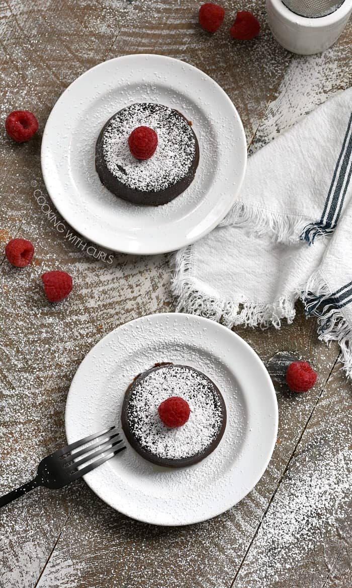 Instant Pot Chocolate Lava Cakes are an impressive dessert filled with a decadent chocolate filling! cookingwithcurls.com