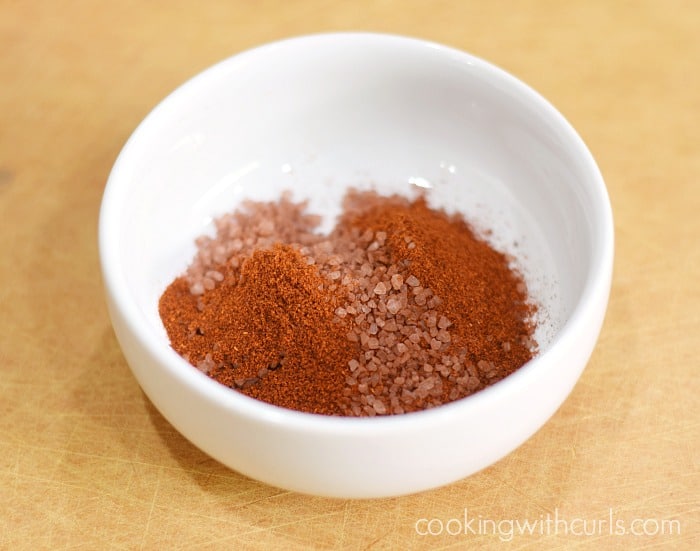 Hawaiian red sea salt and smoked paprika in a small bowl.