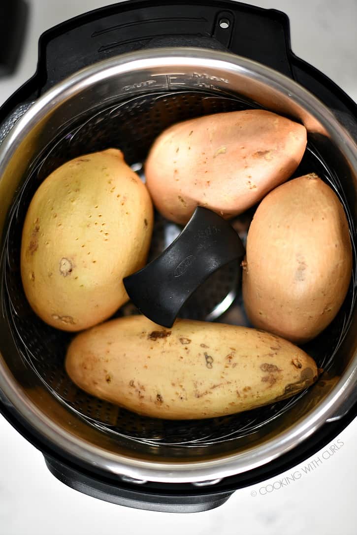 Instant Pot Sweet Potatoes nestled in their pressure cooker! cookingwithcurls.com