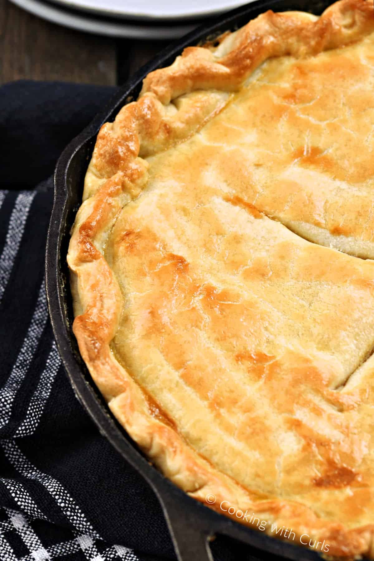 Looking down on the left side of a skillet chicken pot pie. 