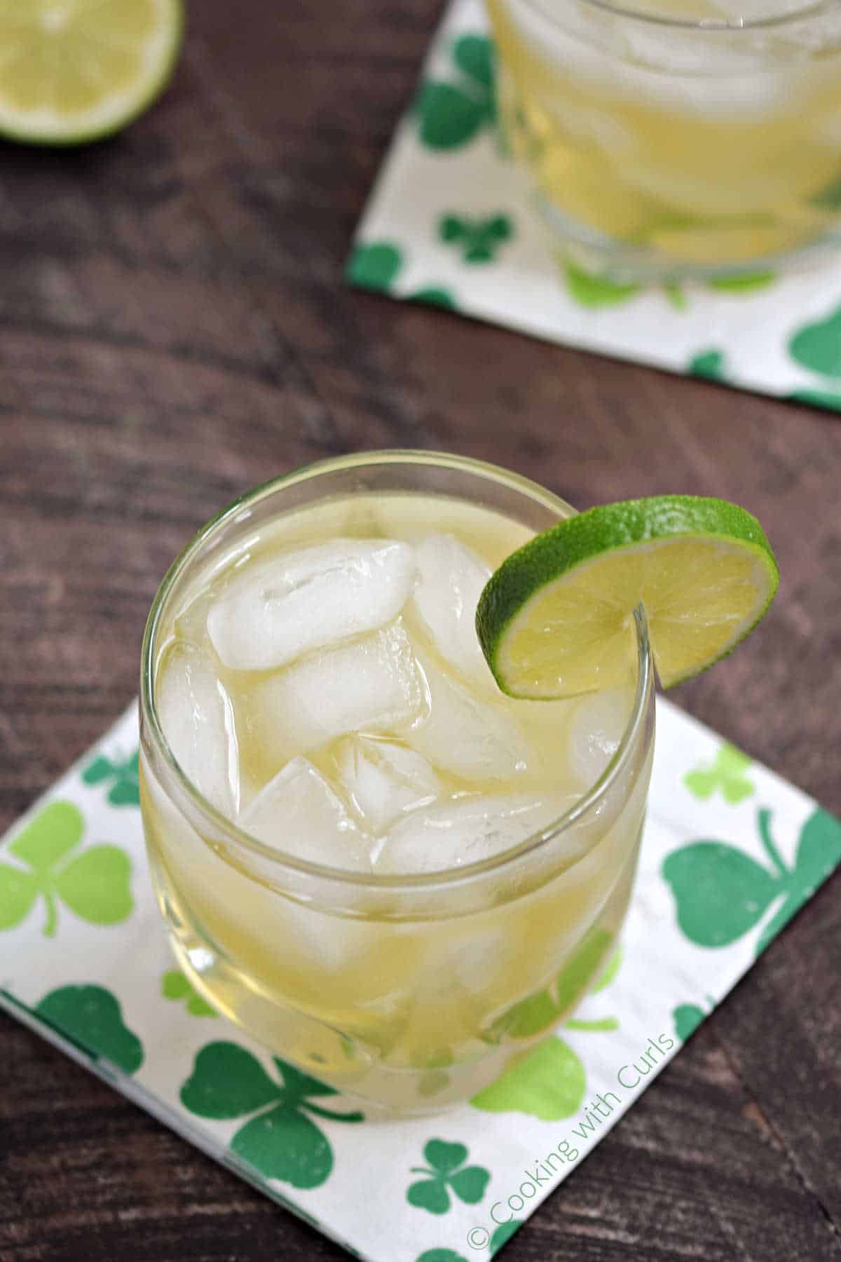 Looking-into-the-top-of-an-ice-filled-glass-with-Jameson-whiskey-and-ginger-ale-with-lime-garnish.