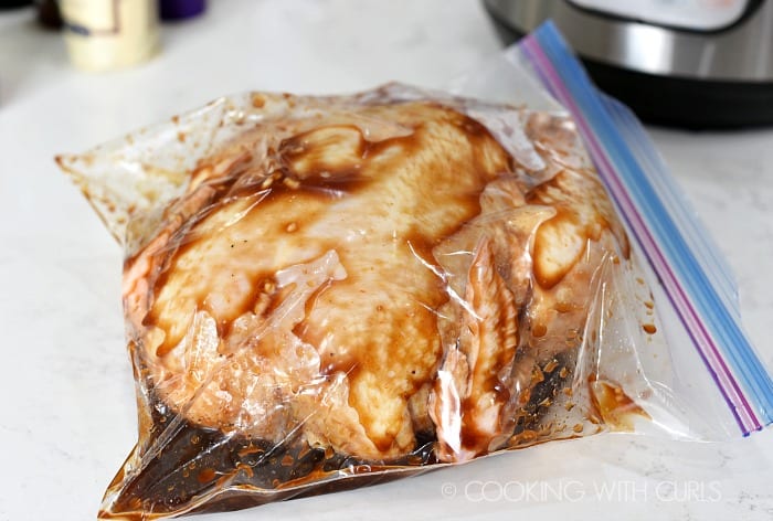 Marinate the chicken in a zipper top bag.