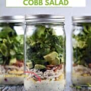 Ranch dressing, tomato, egg, bacon, avocado, and lettuce layered in a Mason jar with title graphic across the top.