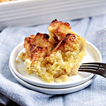 Pina Colada Bread Pudding served on a small white plate.