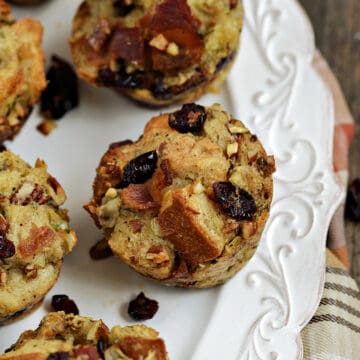 Six stuffing muffins recipe on a white serving platter.