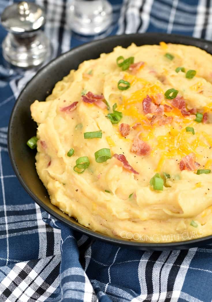 Skip the boring potatoes and surprise your family with Instant Pot Loaded Mashed Potatoes instead! cookingwithcurls.com