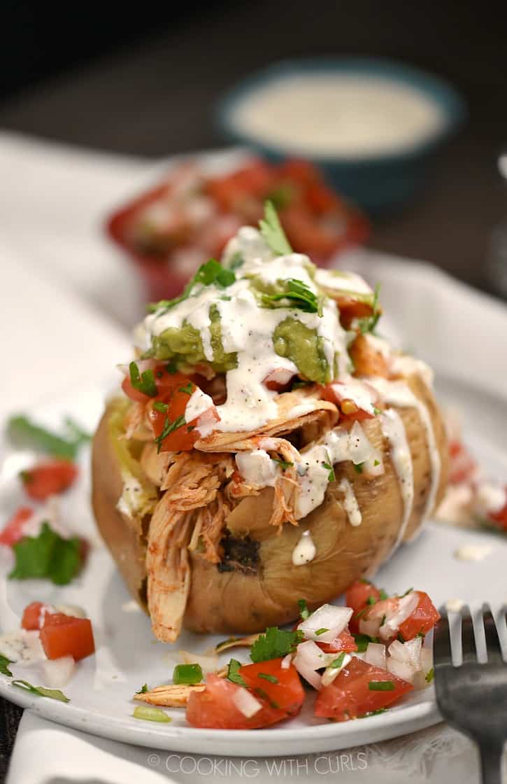 These Chicken Taco Stuffed Sweet Potatoes are insanely delicious, easy to make with an Instant Pot and Whole30 and Paleo compliant!! cookingwithcurls.com